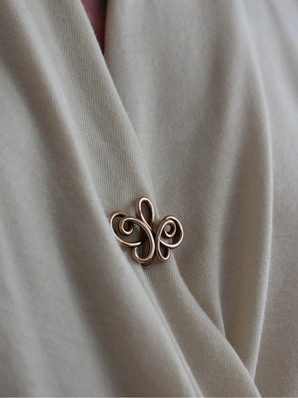 Antique Gold-Tone Swirl Ribbon Brooch